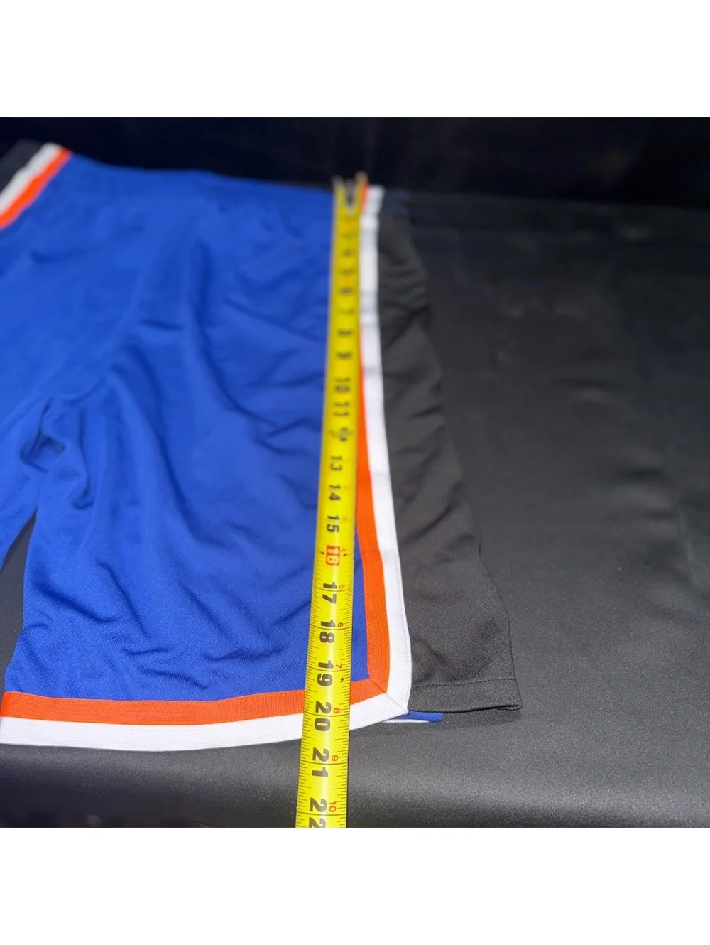 Blue Athletic Shorts with Orange and White Trim